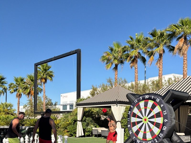 Giant kick dart and outdoor game stations at a Grazie Mille event