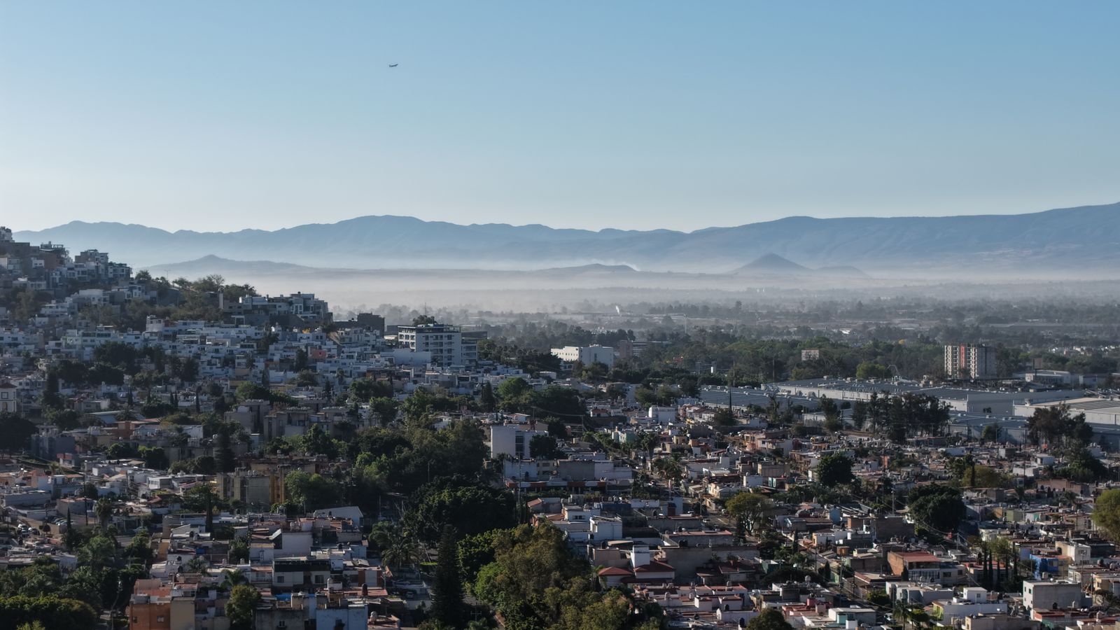 Guadalajara city skyline with mountains beyond the valley — where Grazie Mille began